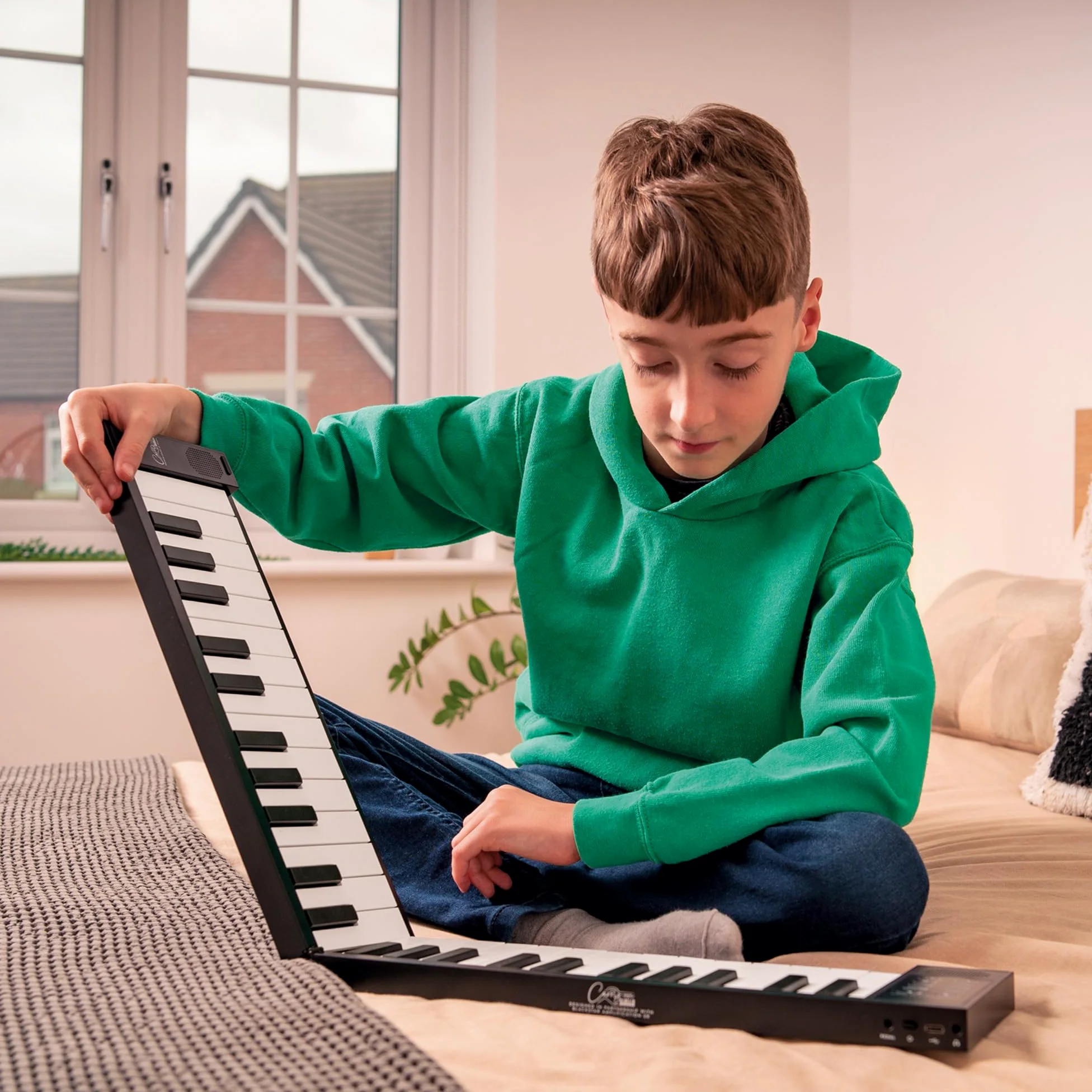 Carry-on FP-49 Dotykowy 49-klawiszowy wrażliwy na dotyk czarny przenośny składany cyfrowy pianino USB MIDI kontroler z akumulatorem