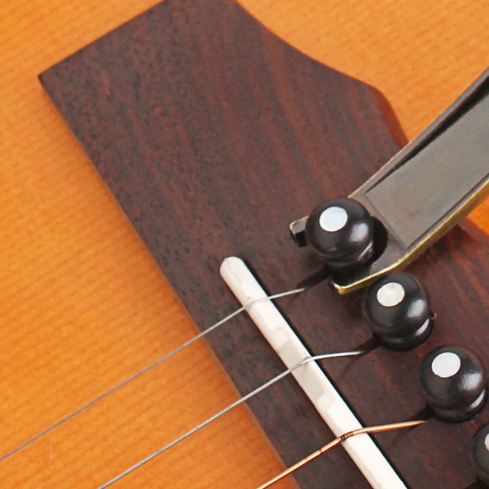 Non-brand kapodaster kapodaster gitara Kapo Capo Tune Clamp Key Trigger Puller do paznokci do gitary/basu/ukulele/banjo - brąz
